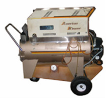 American Kleaner Leader B-1 used and rebuilt diesel fired hot water pressure washer with 1000 pounds per square inch at 3 gallons per minute and a 110 volt motor